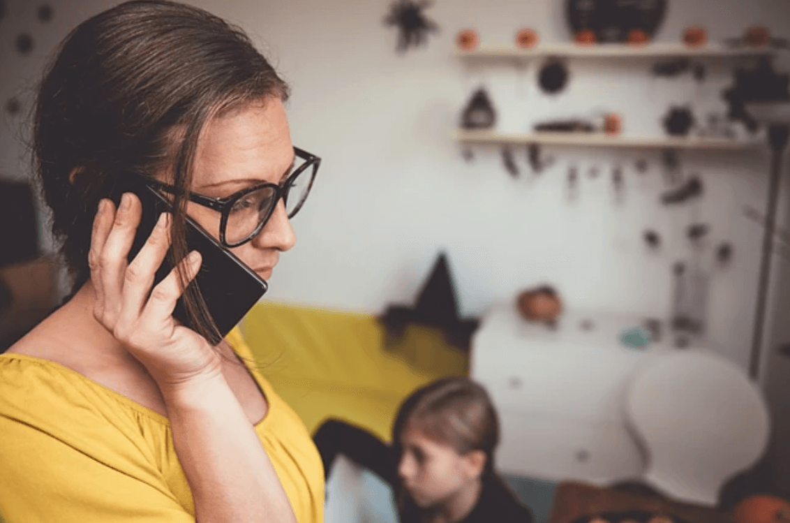 Worried mother on phone